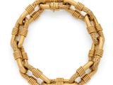 un bracelet plaqué or, signé Van Cleef