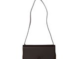 a brown and black purse with a metal clasp on a white background