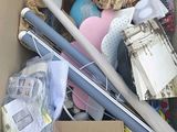 a cardboard box filled with assorted household items
