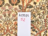 a label on a carpet with a price tag attached to it