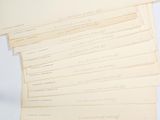 a lot of papers that are stacked on top of each other