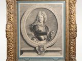 an old picture of a man sitting in a chair in a gold frame