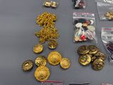 a lot of gold and silver jewelry on a table