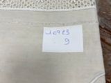 a piece of cloth that has a label on it