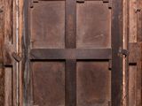 an old wooden window with peeling paint on the outside of it