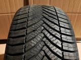 a close up of a tire on a cardboard box
