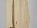 a beige coat on a mannequin mannequin mannequin mannequin mannequin mannequin mannequin mannequin mannequin