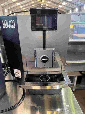 a coffee machine that is sitting on a table
