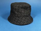 a close up of a black hat on a blue background