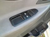 a close up of a car ' s door handle and control panel