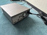 an image of a computer power supply sitting on the floor