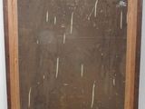 an old picture of a painting hanging on a wall in a room