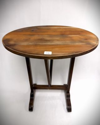 a wooden table with a label on it