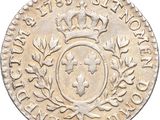 a close up of a coin with a crown on it