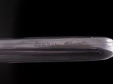 a close up of a baseball bat on a black background