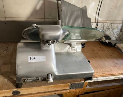 a machine that is sitting on top of a wooden table