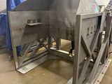 a large machine that is sitting in a warehouse