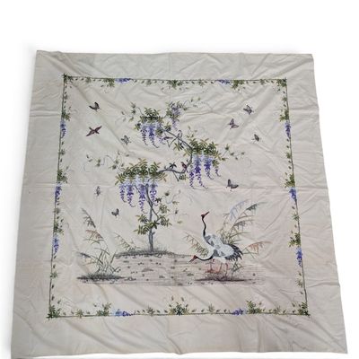 an image of a quilt with birds and flowers on it