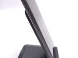 a cell phone that is sitting on top of a stand