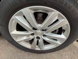 a close up of a tire on a car