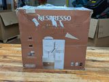 a box of nespresso coffee sitting on a table