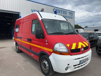 a red van that is parked in front of a building