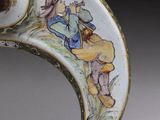 a close up of a decorative object with a bird on it