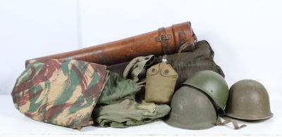 a pile of military items on a white table