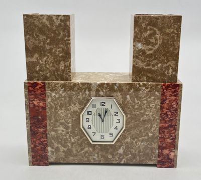 a clock that is sitting on top of a table