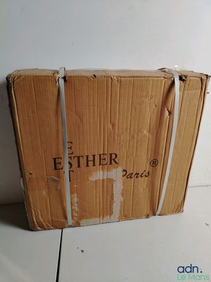 a cardboard box that is sitting on the floor