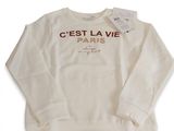 un sweat-shirt blanc sur lequel est imprimé « gest la vie paris »