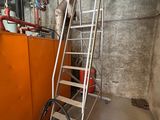 a picture of a room with a ladder and a bag on the floor