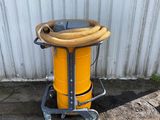 a yellow dust collector with a yellow hose on a cart
