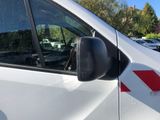 a white van with a red stripe on the side of it