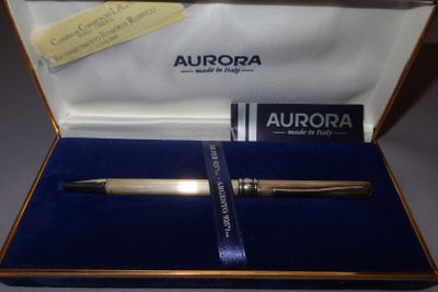 a pen that is sitting in a box on a table