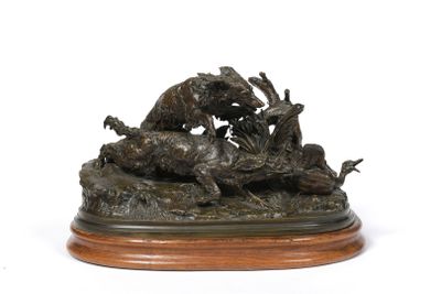 a bronze sculpture of a group of animals on a wooden base