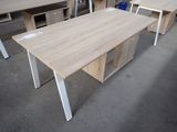 two desks and two chairs in a room