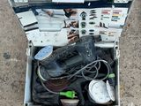 a box with a pair of shoes in it on the ground