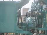 an image of a machine that is working on a piece of machinery