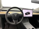 the interior of a car with a steering wheel, dashboard, and display screen