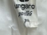 a white shirt with a black and red logo on it