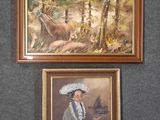 two paintings of a woman and a deer are hanging on a wall
