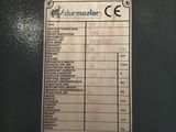 an image of a sign on the side of a machine that is not working