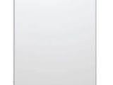 a white dishwasher sitting on top of a white counter