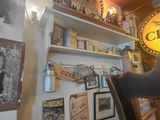 a person sitting at a table in a restaurant