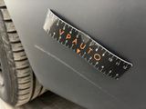 a close up of a sticker on the side of a car