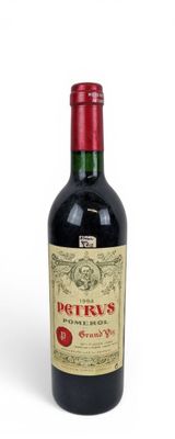 a bottle of wine that is sitting on a table