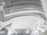 a close up of a glass of water with a label on it