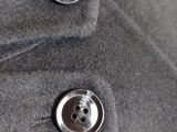 buttons on a gray coat with a white background