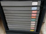 an image of a filing cabinet with a lot of drawers